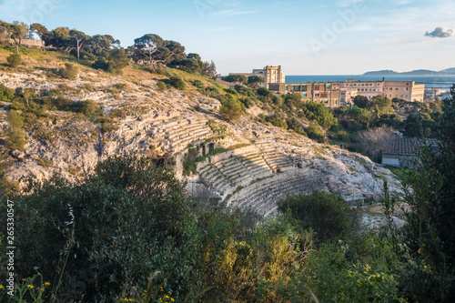 The Roman Amphitheatre of Cagliari, Sardinia, Italy. Built in the 2nd century AD, half carved in the rock of a hill. © Luis