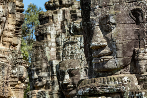 Beautiful face sculptures at the famous Bayon temple in the Angkor Thom temple complex, Siem Reap, Cambodia © Michael Evans