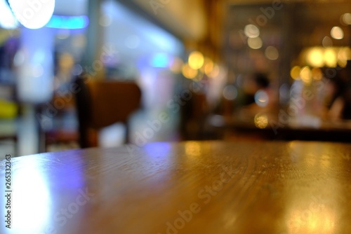 Close up Surface of Wooden Table in Cafe with Bokeh Background.  Selective Focus 