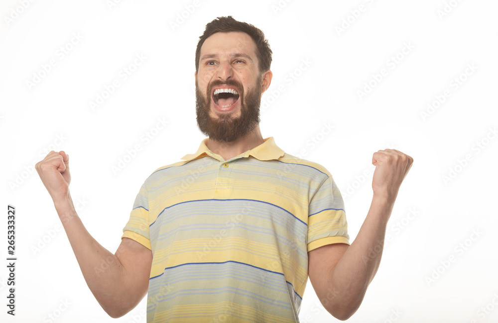 young bearded man celebrating victory young bearded man celebrating victory