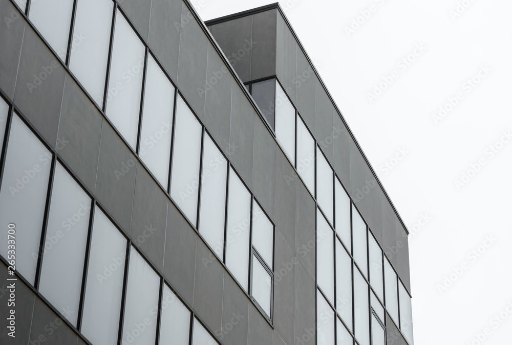 large gray concrete structure with empty windows large gray concrete structure with empty windows