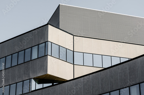 tall large gray concrete building with empty windows