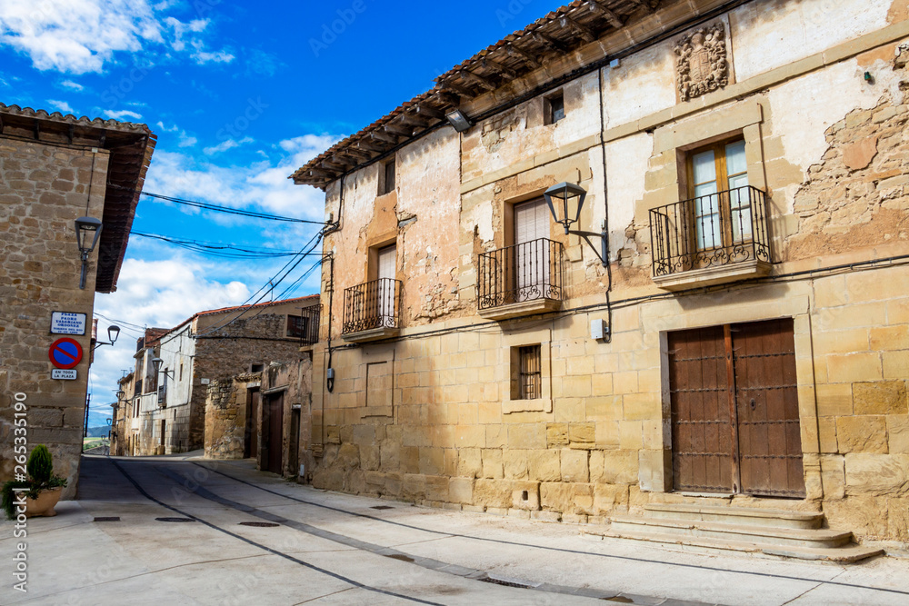 Torres del Rio street view in Navarre, Spain on the Way of St. James, Camino de Santiago on a sunny May day