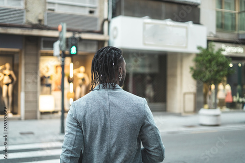 African American Guy walking down the street