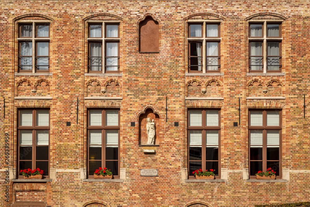 Straight view of the red brick building in Bruges, Belgium