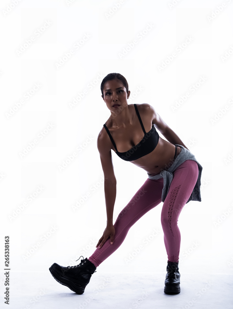 The beauty woman wearing exercise suit,stretching body,warm up for dancing