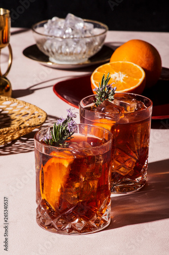 Negroni, an Iba cocktail, with 1/3 gin, 1/3 bitter, 1/3 vermut, in luxury pop style, rich and colorful.