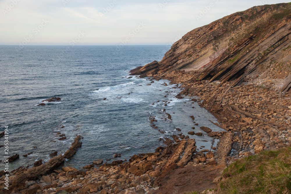 Horizontal landscape of rocky inlet in northern Spain