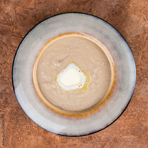 Amaranth porridge with butter.