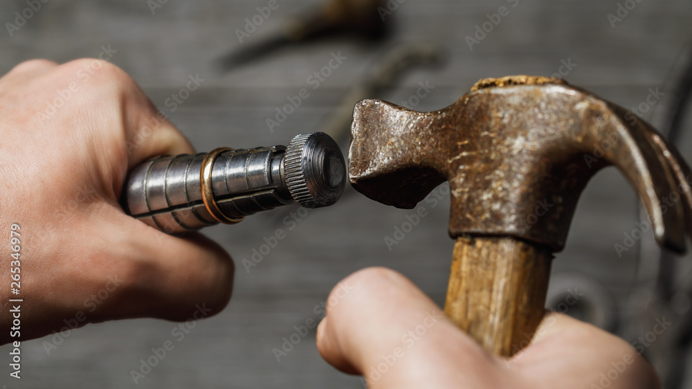 Jeweler increases the size of the gold ring, a close-up of the workflow Jeweler increases the size of the gold ring, a close-up of the workflow