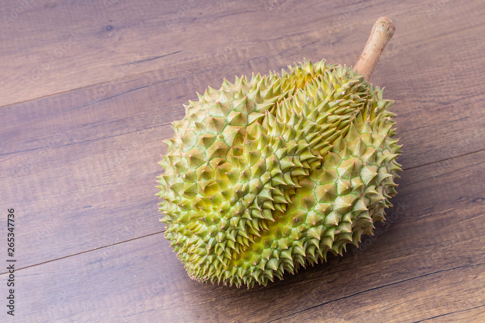 Durian on wood table background. Durian on wood table background.