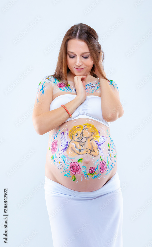 pregnant woman with a beautiful pattern on her stomach pregnant woman with a beautiful pattern on her stomach