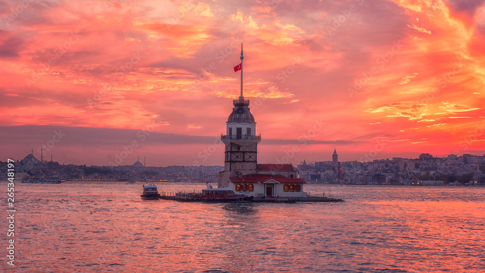 Amazing sunset view of Maiden's Tower (Kiz Kulesi) also known as Leander's Tower situated on Bosphorus, symbol of Istanbul, Turkey. Scenic travel background for wallpaper or guide book