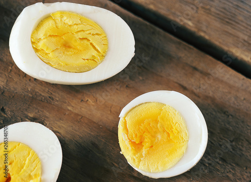 halves of boiled eggs with orange yolk