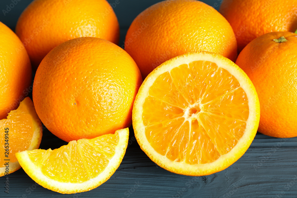 Group of ripe oranges on wooden table, closeup Group of ripe oranges on wooden table, closeup