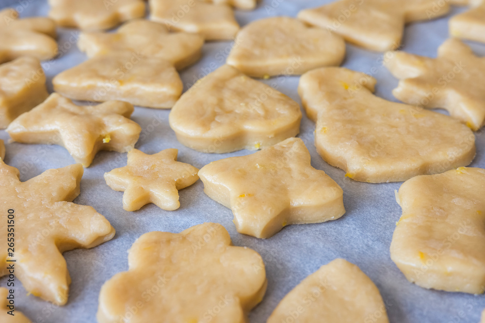 Raw cookies before baking. Close up view, selective focus. Confectionery cuisine.