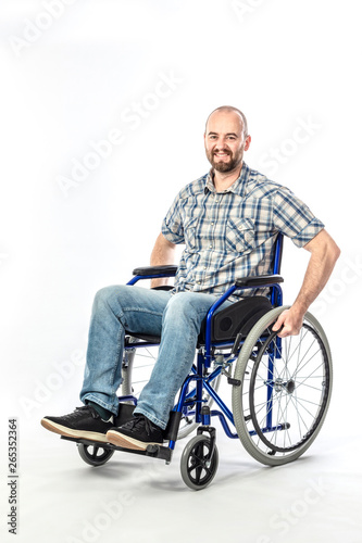 smiling man on wheelschair