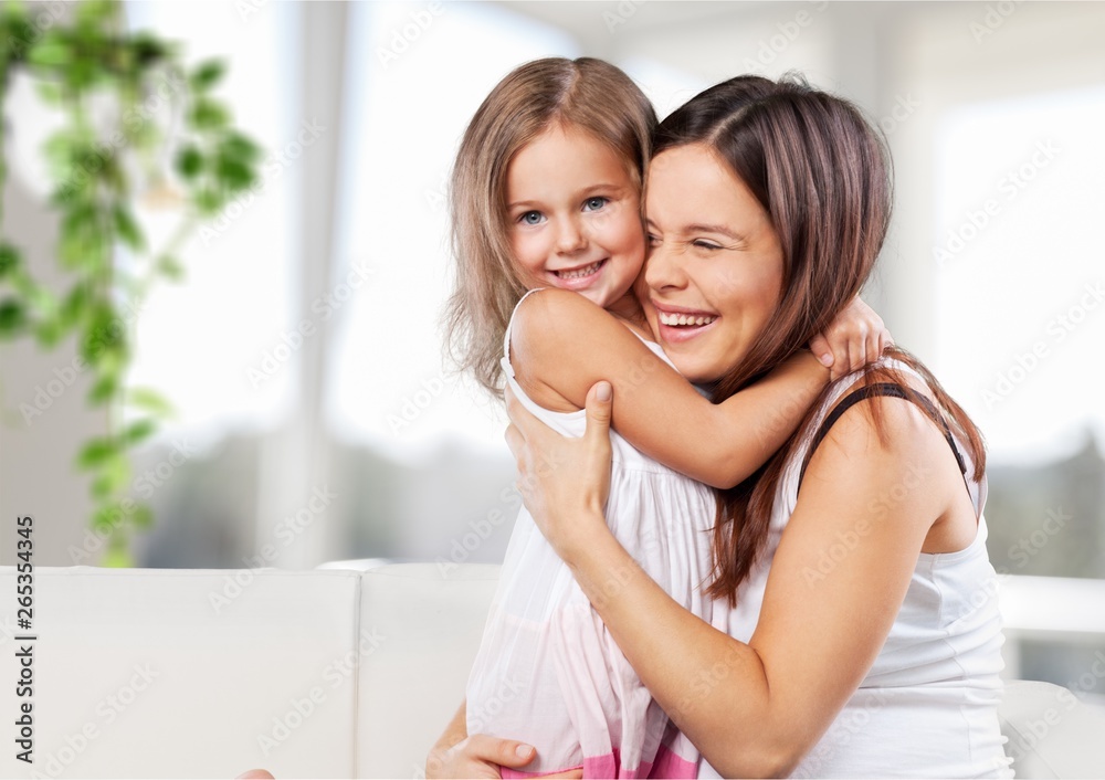 Happy Mother and daughter hugging Happy Mother and daughter hugging