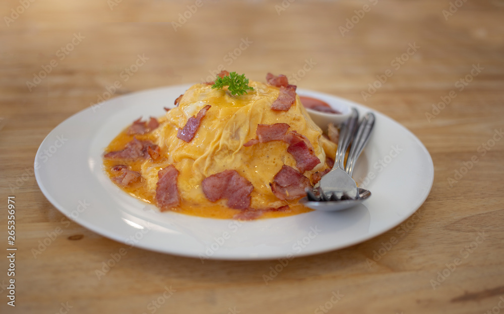 food design omlet egg with bacon as lava