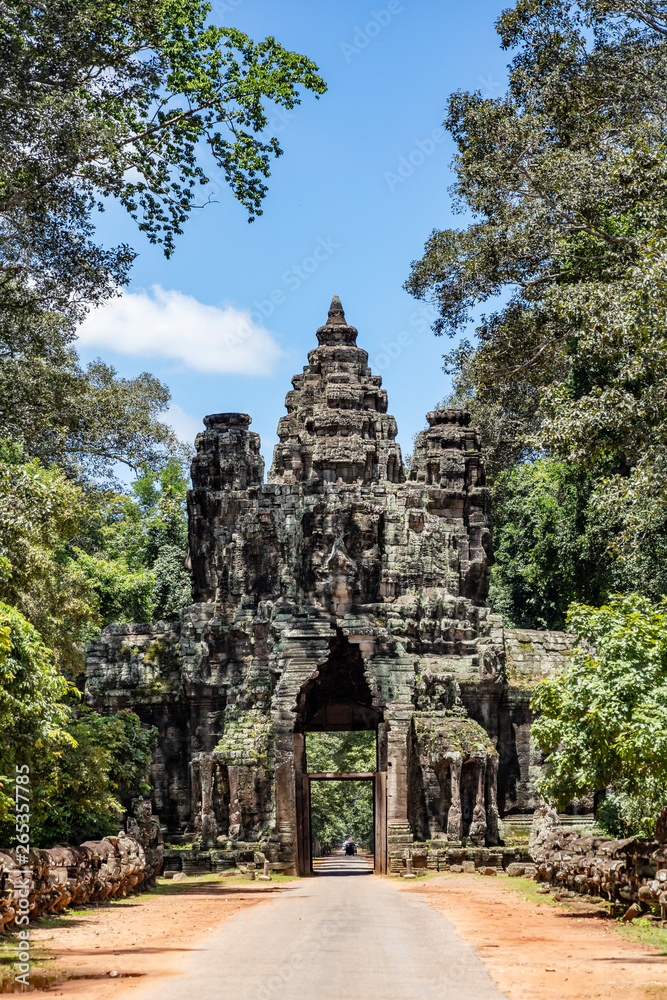 Amazing face sculptures on the gateway at the Angkor Thom temple complex in Siem Reap, Cambodia