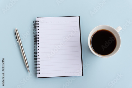 Top View of Note Pad, Cup of Coffee and Pen