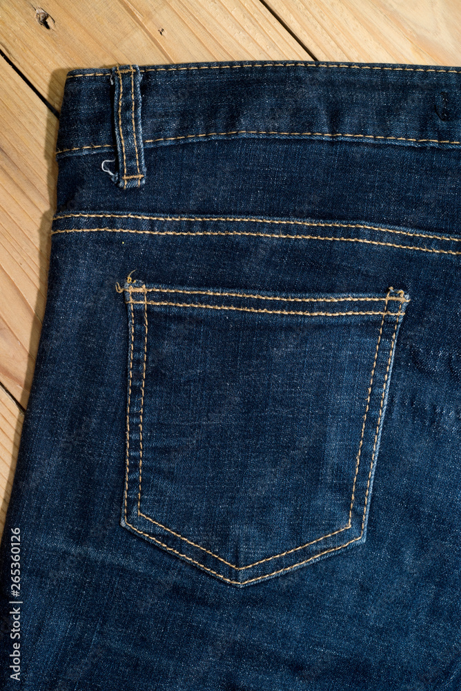 Close up of blue denim jeans fabric texture background. Close up of blue denim jeans fabric texture background.