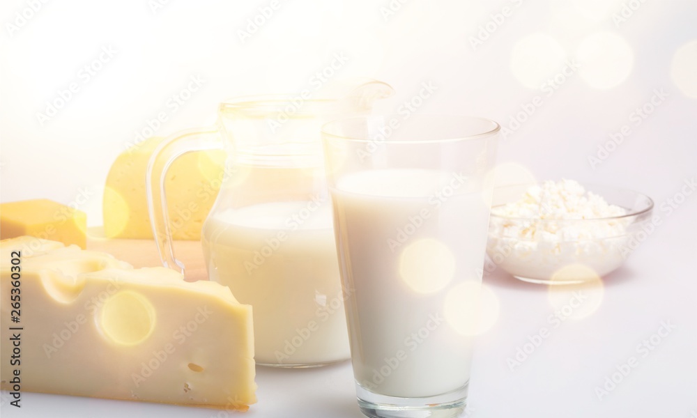 Dairy Products- Cheeses and Milk on the Grey Background Dairy Products- Cheeses and Milk on the Grey Background
