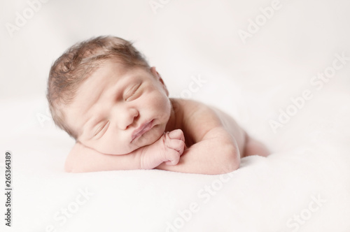 Newborn Baby Sleeping Peacefully on Soft Blanket - Arms Crossed