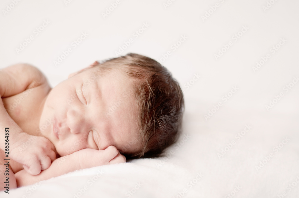 Newborn Baby Sleeping Peacefully on Soft Blanket Newborn Baby Sleeping Peacefully on Soft Blanket