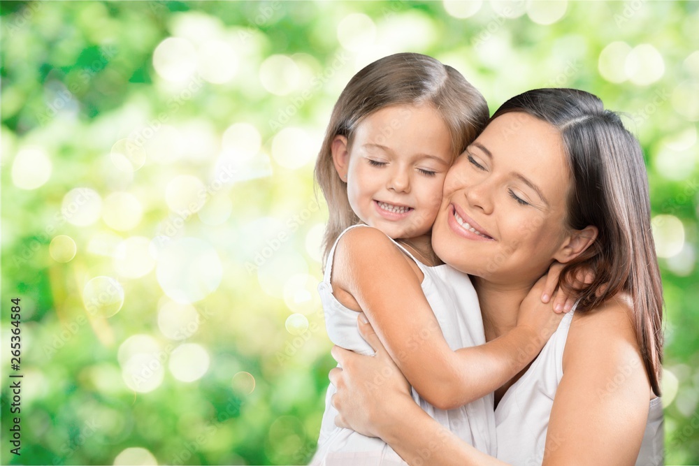 Happy Mother and daughter hugging Happy Mother and daughter hugging