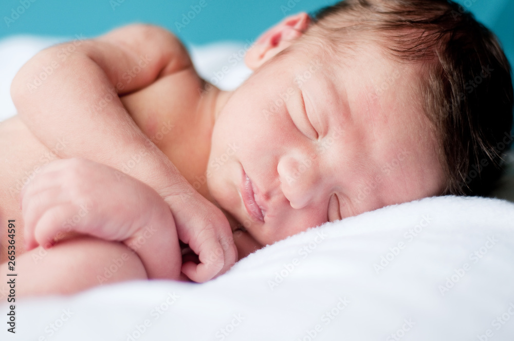 Newborn Baby Boy Sleeping Peacefully on Soft Blanket Newborn Baby Boy Sleeping Peacefully on Soft Blanket