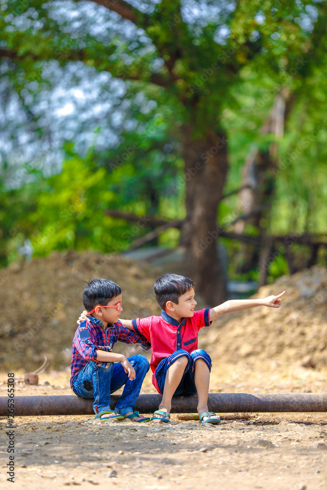 Fototapeta premium Indian Child Playing in outdoor