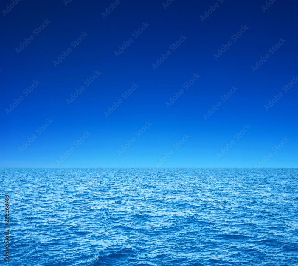 Obraz premium Blue sunny sea water surface