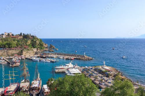 Mediterranean landscape in Antalya. View of the mountains, sea, yachts and the city - Antalya, Turkey, 04.23.2019