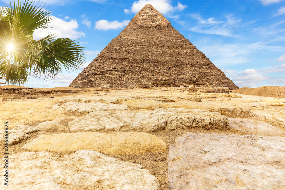 The Pyramid of Khafre Chephren in the sunny desert of Giza, Egypt The Pyramid of Khafre Chephren in the sunny desert of Giza, Egypt
