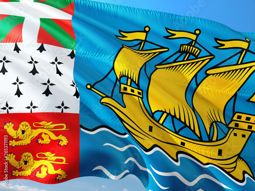 Flag of Saint Pierre And Miquelon waving in the wind against deep blue sky. High quality fabric.