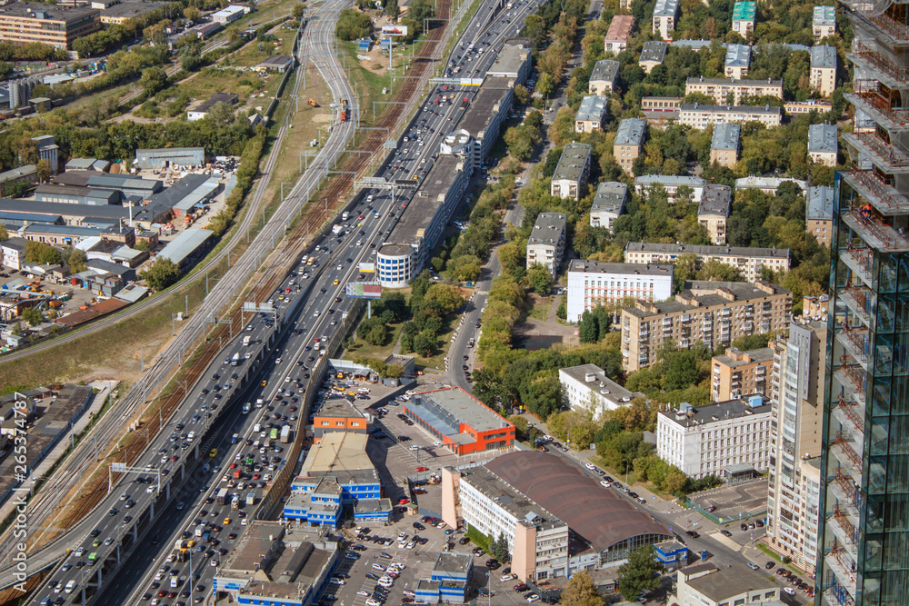 The view from the observation deck of Moscow. Traffic on urban roads. Cars driving on highway.