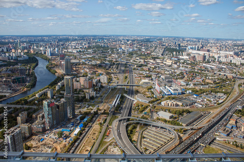 The view from the observation deck of Moscow. Top view of Moscow city. Summer in the city, sky and clouds.