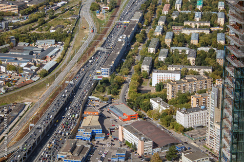 The view from the observation deck of Moscow. Traffic on urban roads. Cars driving on highway.