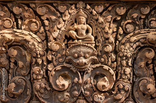 Bas-relief of Shiva mounted on Kala in Banteay Srei; Angkor, Siem Reap, Cambodia photo