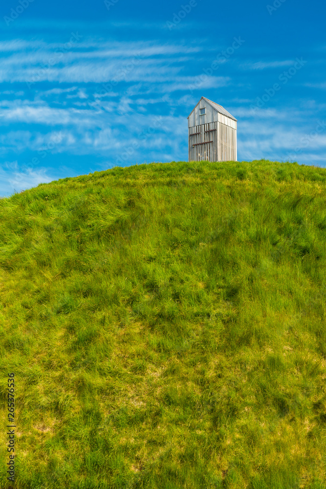 Thufa grassy dome with fish drying house on top is an art installation by Olof Nordal; Reykjavik, Iceland Thufa grassy dome with fish drying house on top is an art installation by Olof Nordal; Reykjavik, Iceland