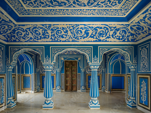Ornate designs on the walls and pillars in blue and white, City Palace, Maharaja Sawai Mansingh II Museum, Mubarak Mahal; Jaipur, Rajasthan, India photo