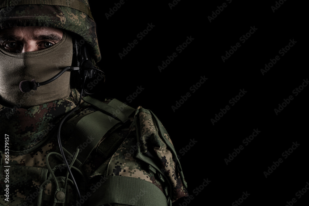 Close up portrait of handsome military man. Image on a black background Close up portrait of handsome military man. Image on a black background