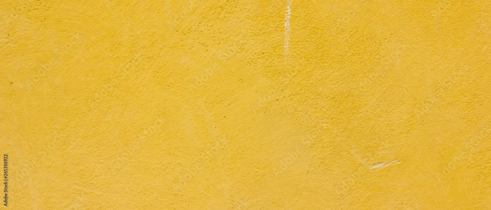Golden stone surface texture. Natural background in gold color. Texture