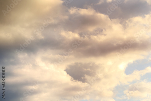 Fototapeta Naklejka Na Ścianę i Meble -  colored, fluffy, cumulus clouds, background