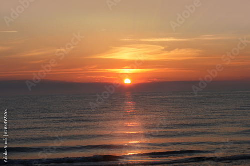 beautiful and romantic sea sunset in orange tones © kittyfly