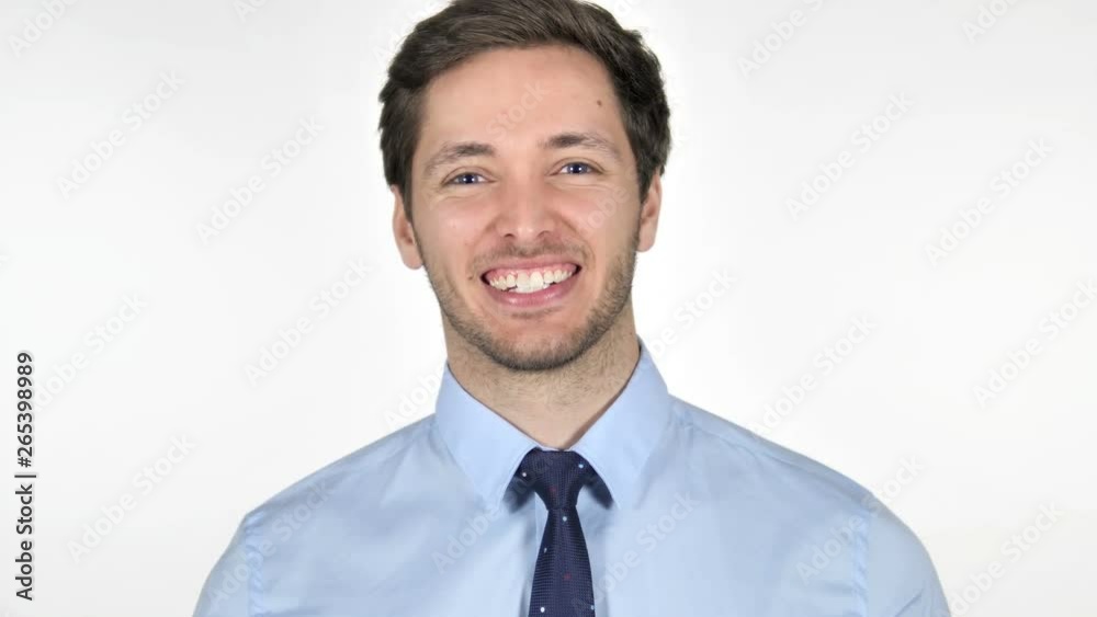 Sign of Victory by Young Businessman on White Background Sign of Victory by Young Businessman on White Background