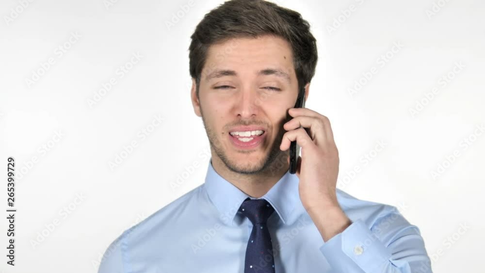 Young Businessman Talking on Phone on White Background Young Businessman Talking on Phone on White Background