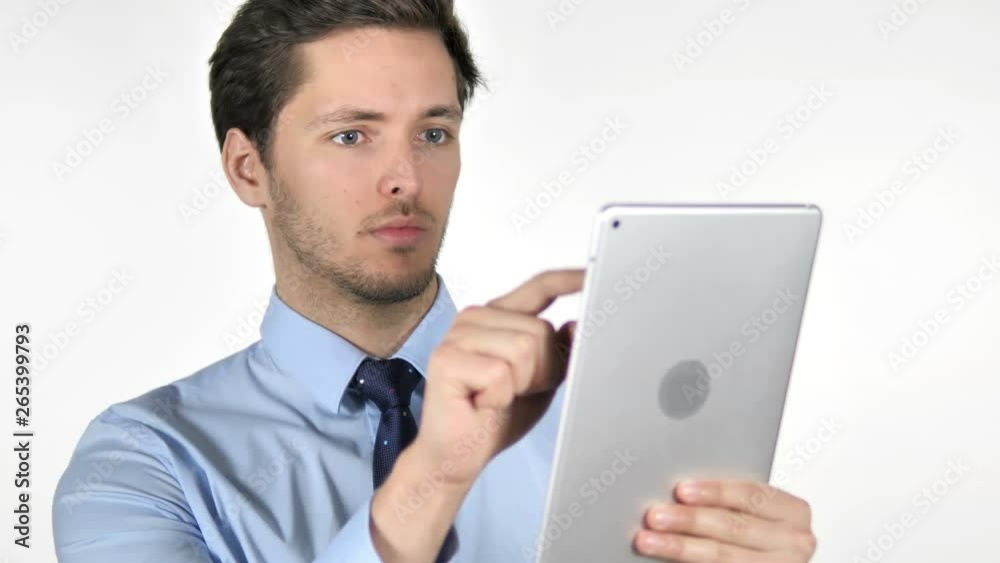 Young Businessman Using Tablet on White Background Young Businessman Using Tablet on White Background