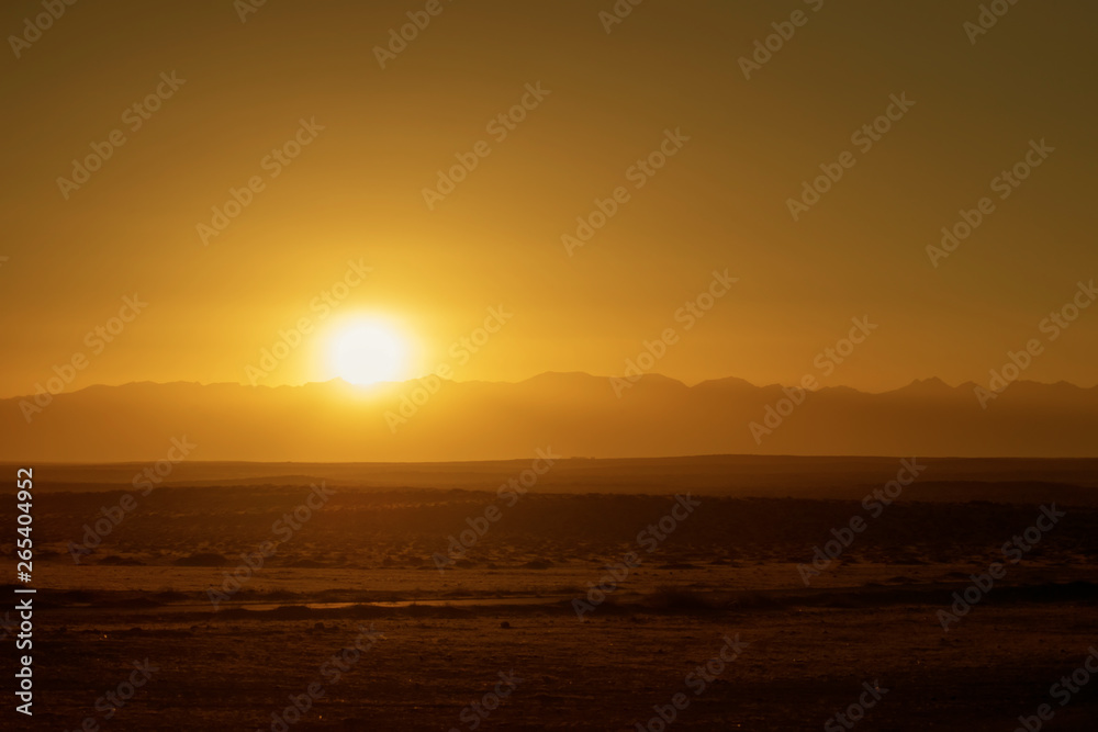 Naklejka premium The sun peered over helan peak.
